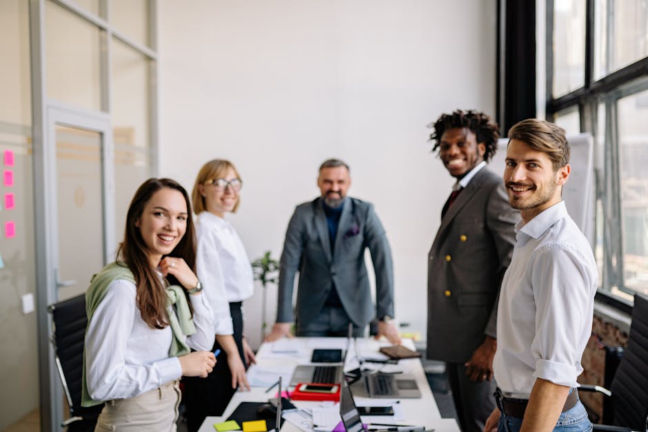 Diverse group of colleagues collaborating in a modern conference room setting